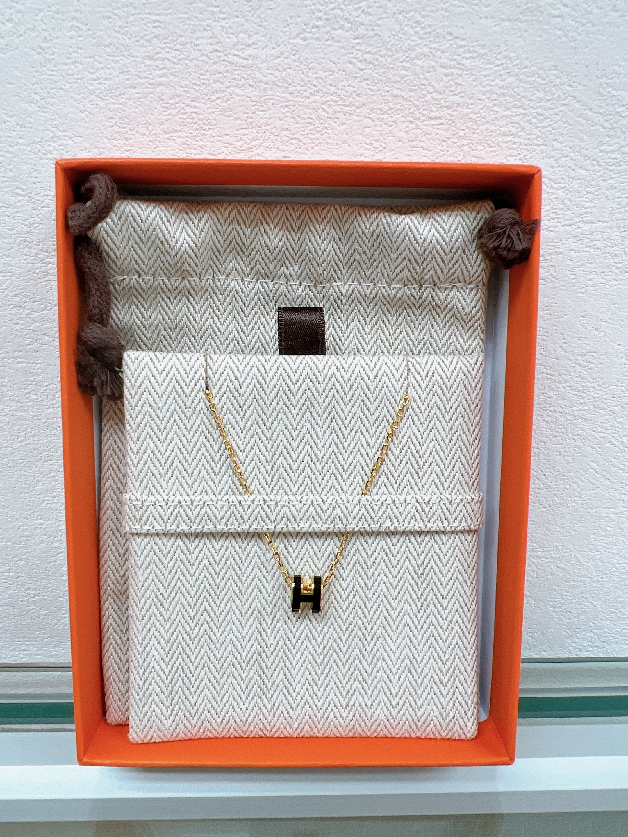 *Unused* Hermes mini pop h necklace (black/GHW)