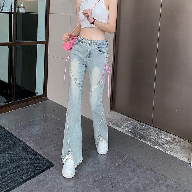 側邊蝴蝶結鬚鬚造型小喇叭牛仔褲-一色