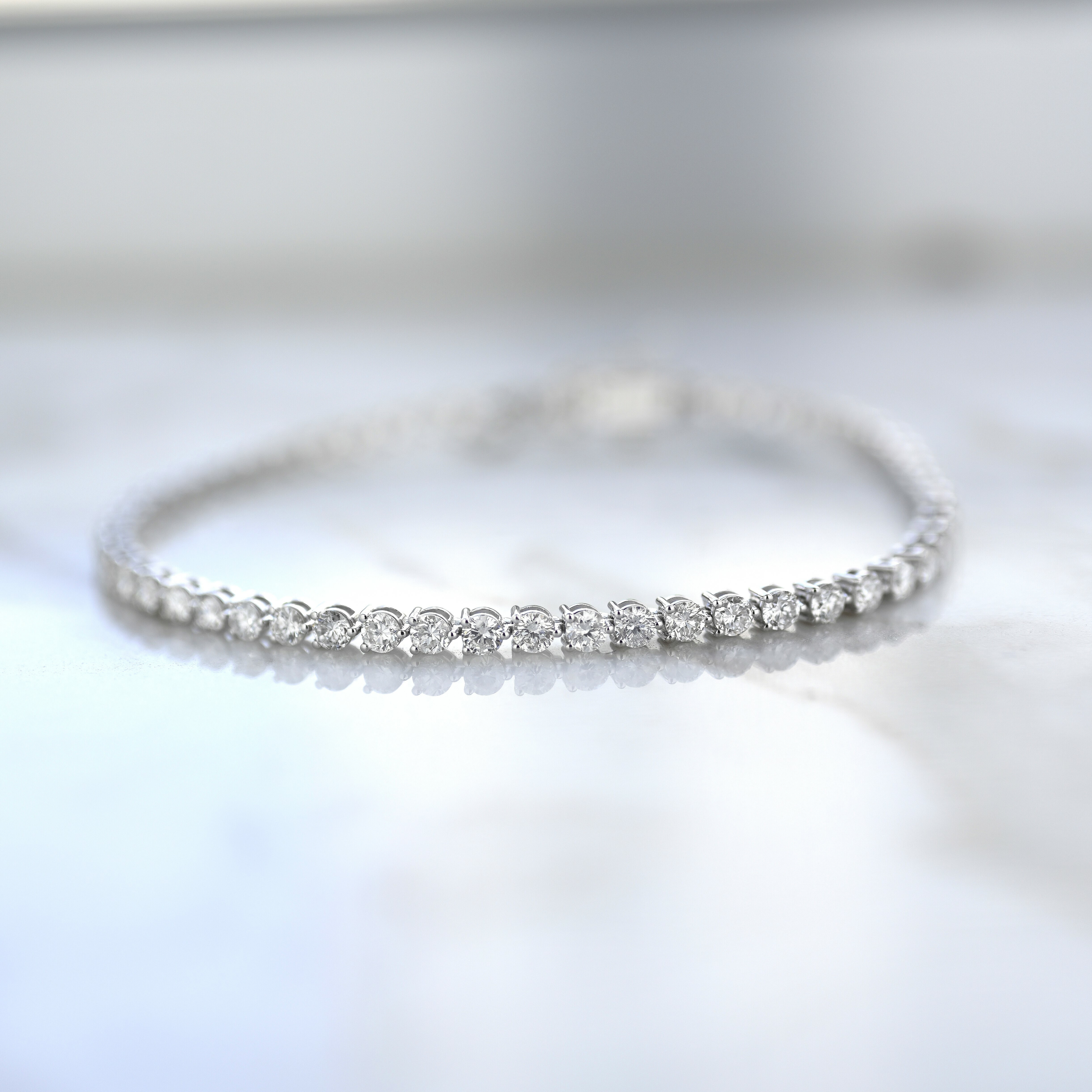 18K Three Prong 2.5mm tennis bracelet