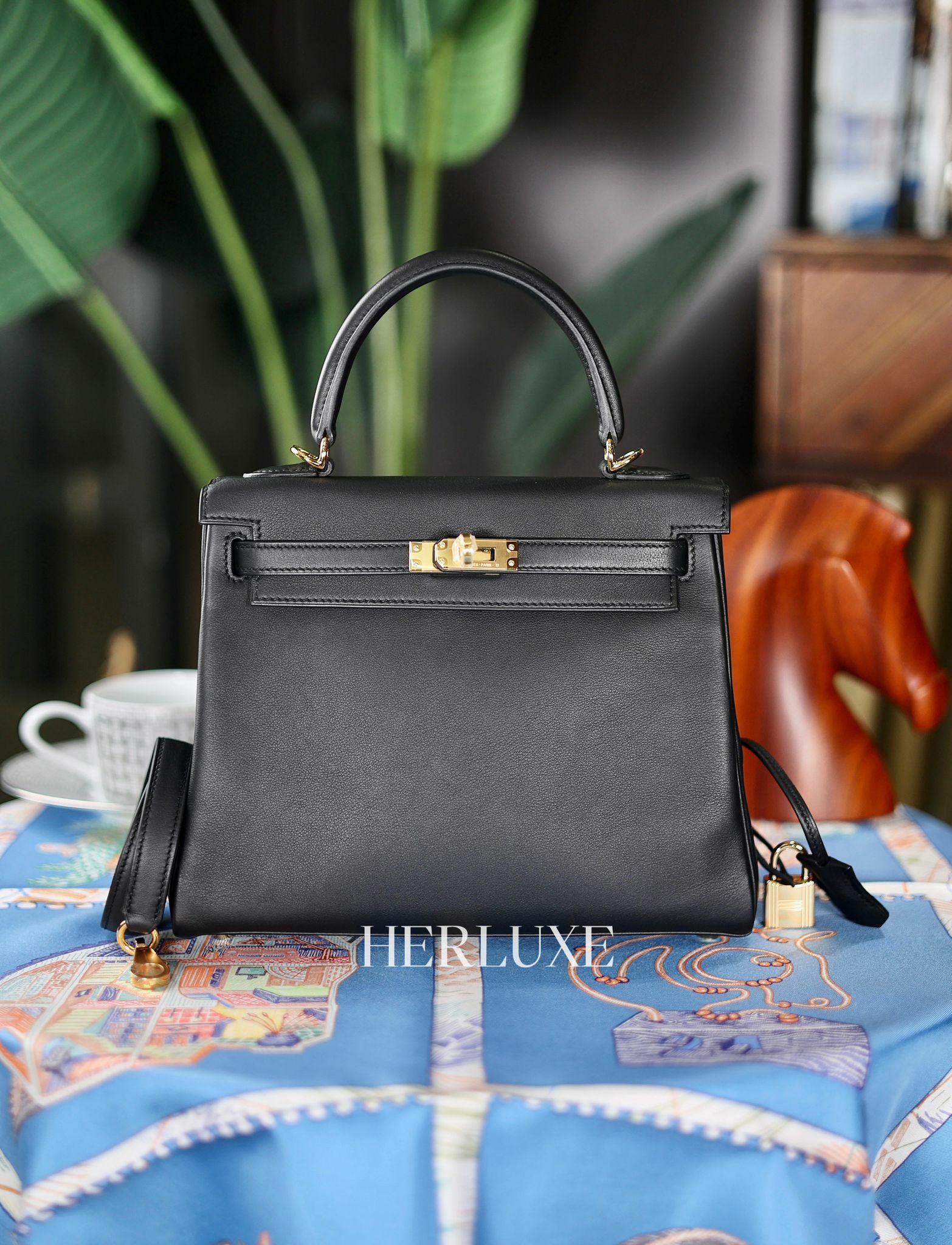 Kelly 25 89 noir cc swift  B