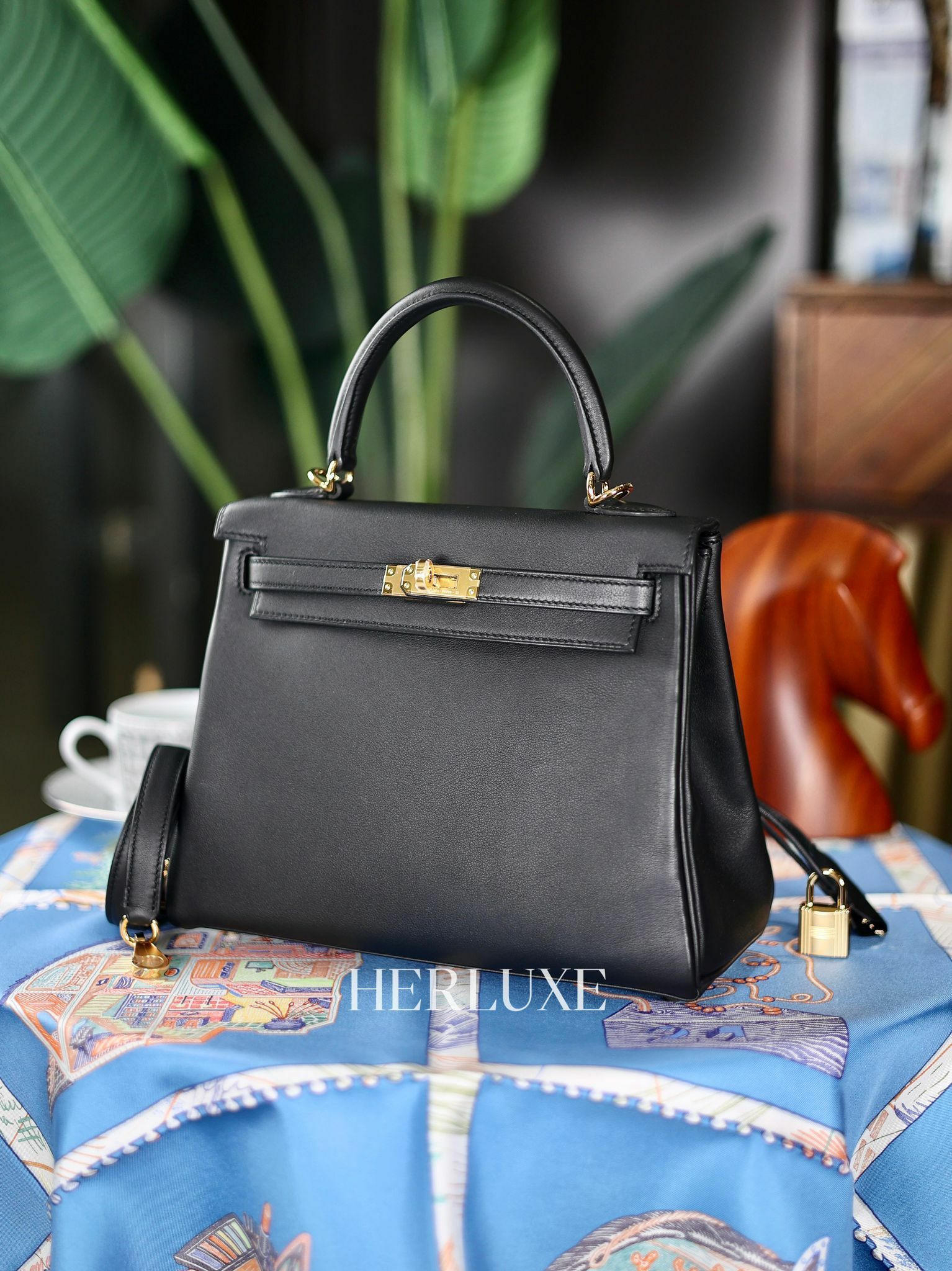 Kelly 25 89 noir cc swift  B