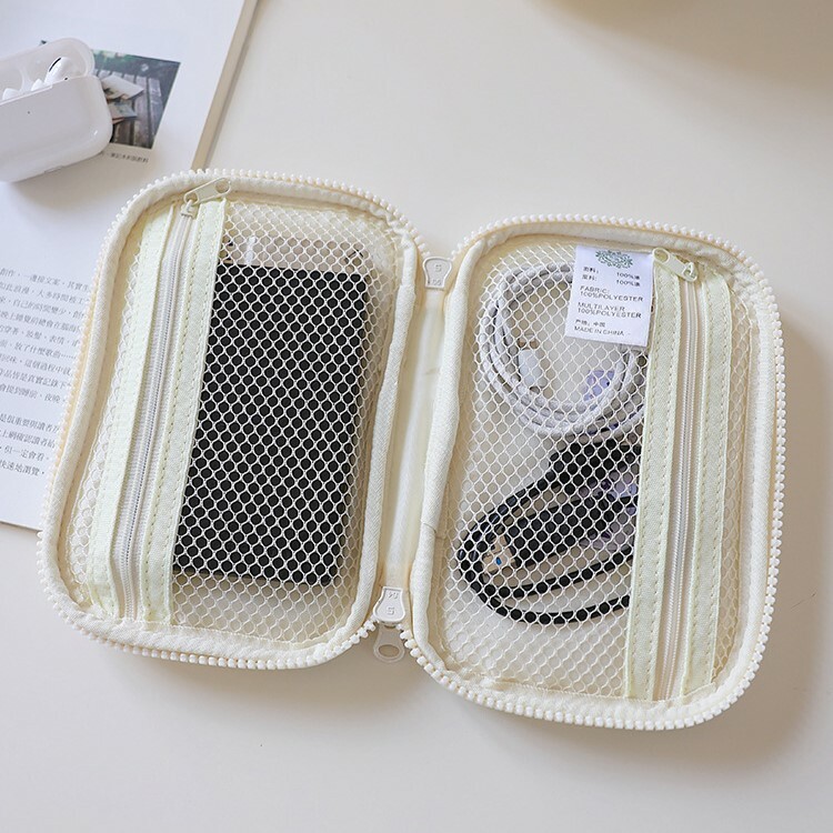 《3888》奶油色鬱金香印花拉鍊收納包