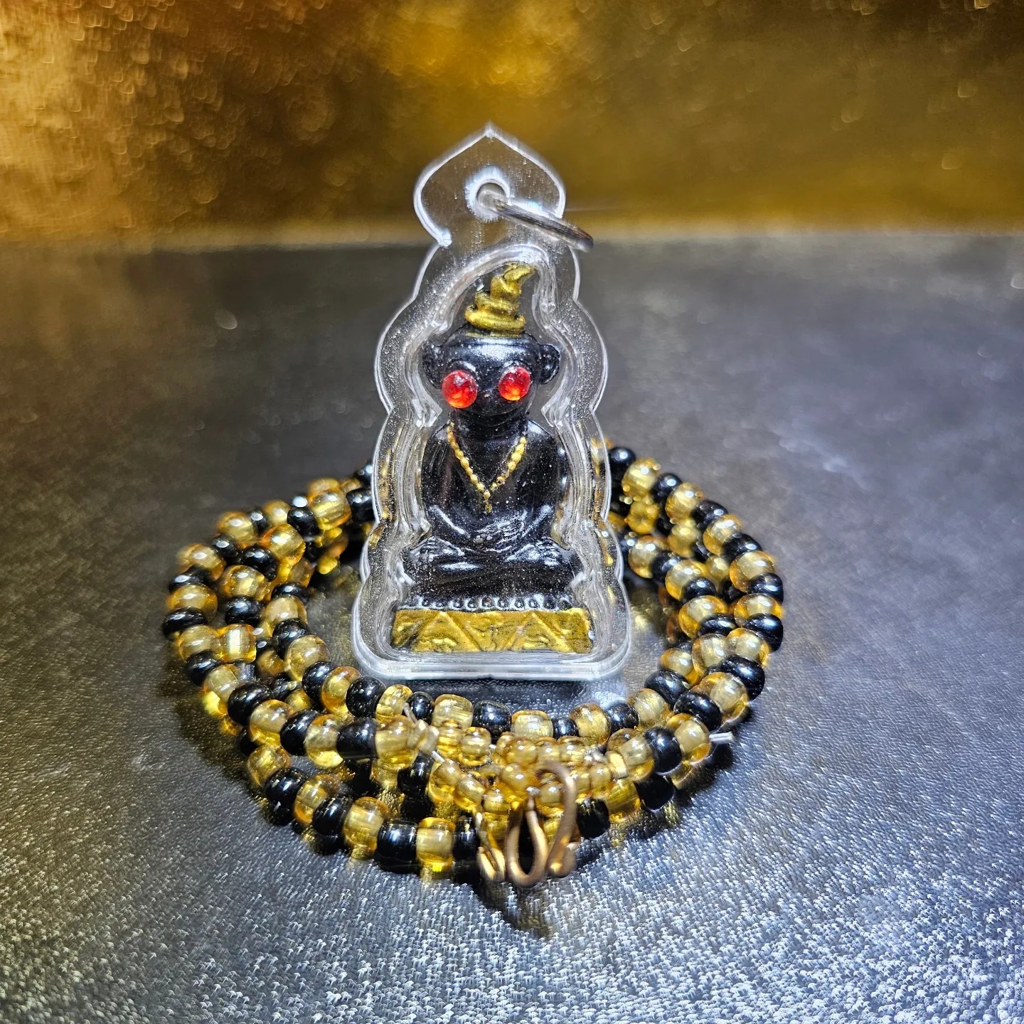 阿贊Cat - 紅眼金角拍罌