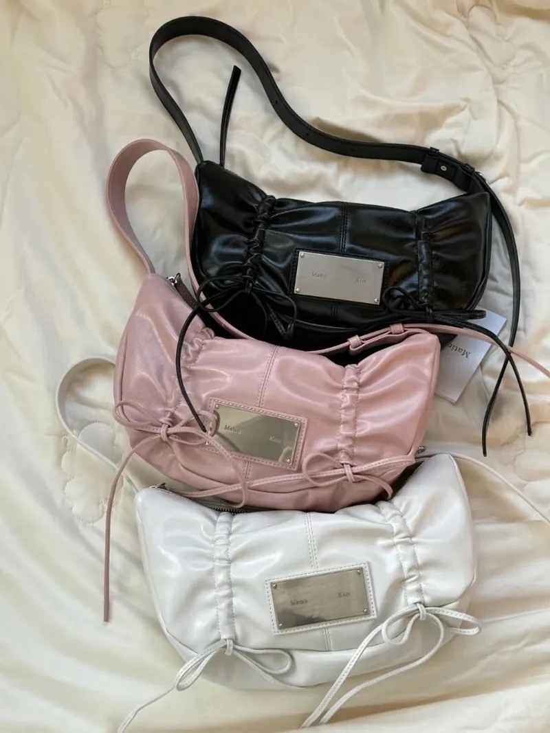 <快速出貨> Matin Kim 經典鐵牌風 蝴蝶結抽繩包