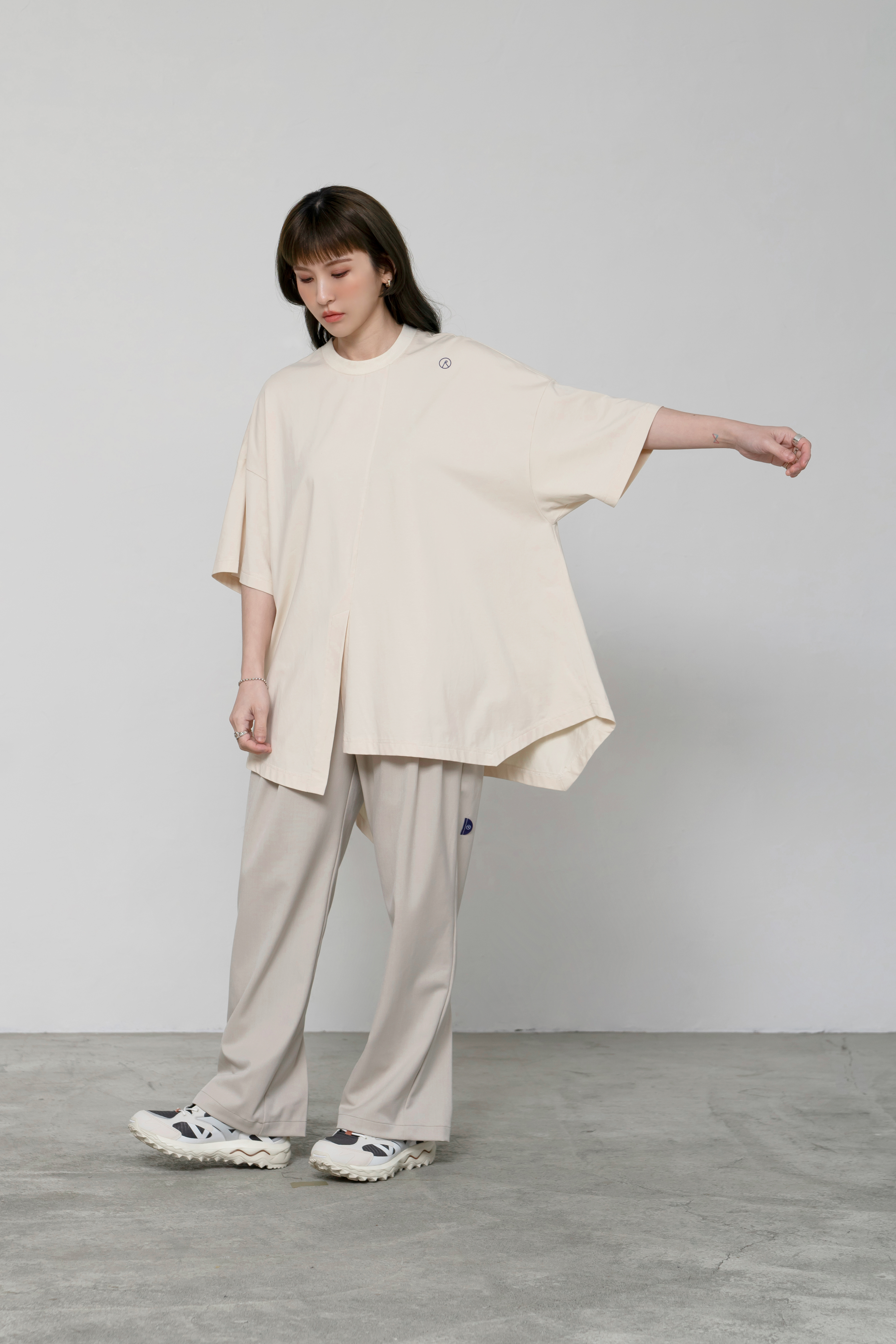 RE:tain -  Irregular Cut Tee | Cream