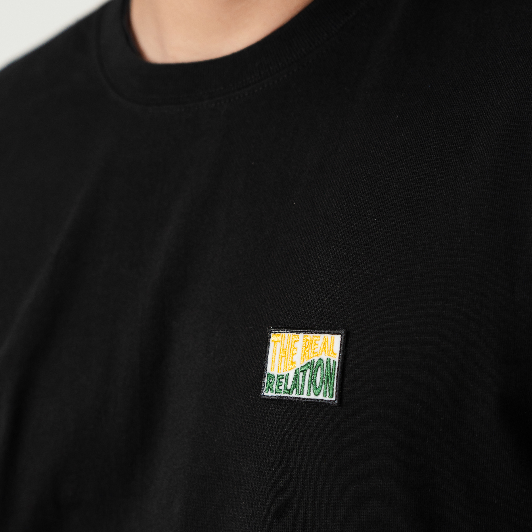 REALATiON 24SS "THE REAL RELATION" FIT TEE - Black