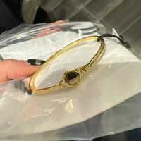 [S] MARC JACOBS 4S4JER001J12-970 LOGO LETTERING BANGLE,LIGHT ANTIQUE GOLD, 196611145510 (SMJ330)
