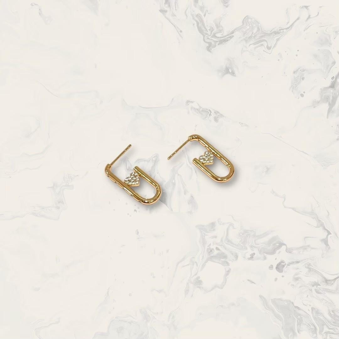 韓國直送-鋼針 前排列小鋯橢圓圈測滿鋯愛心 鍍玫瑰金