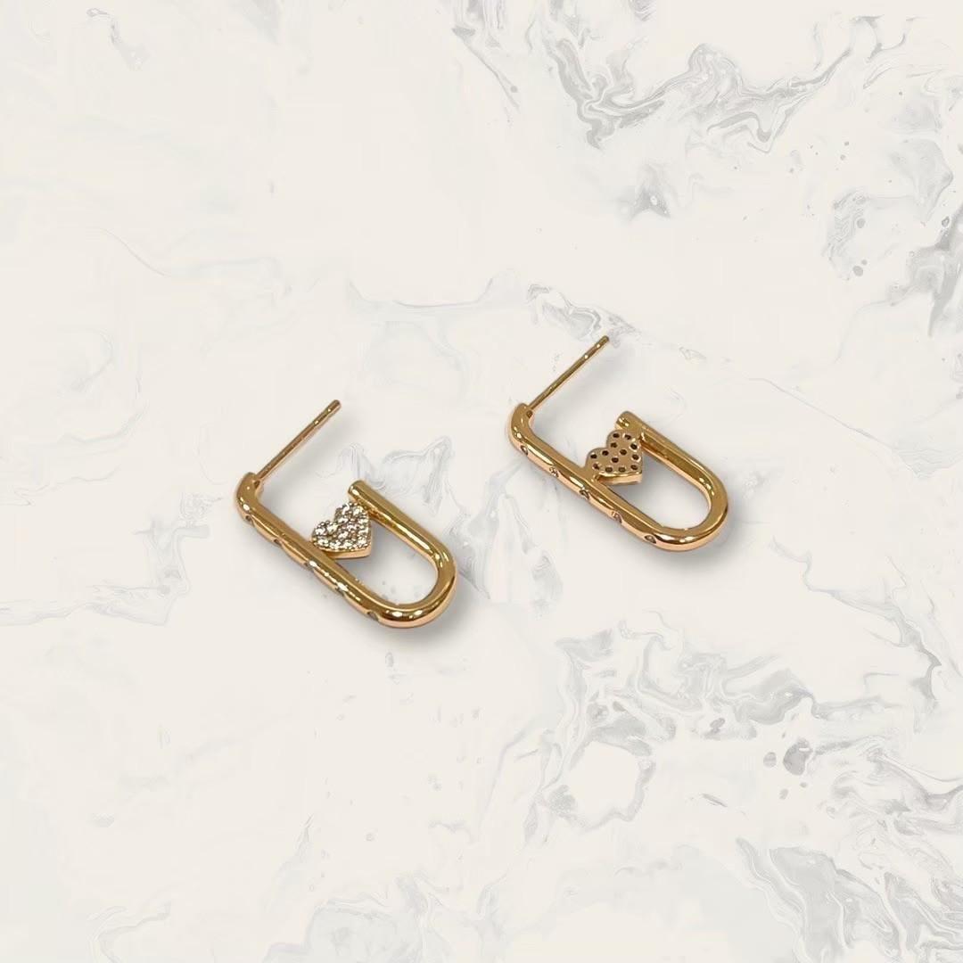 韓國直送-鋼針 前排列小鋯橢圓圈測滿鋯愛心 鍍玫瑰金