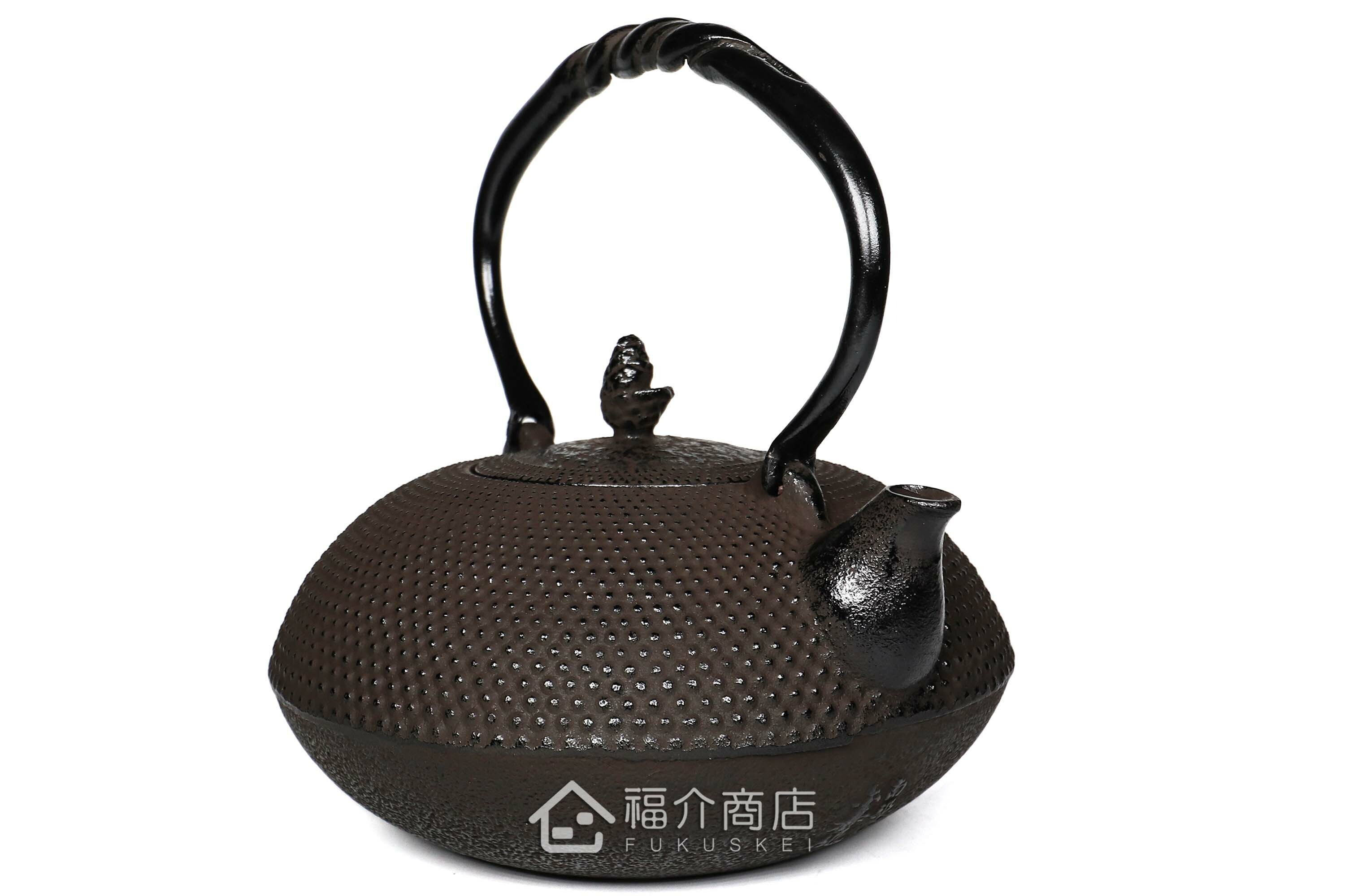 金秀堂所製作的日本鐵壺,壺身設計霰紋