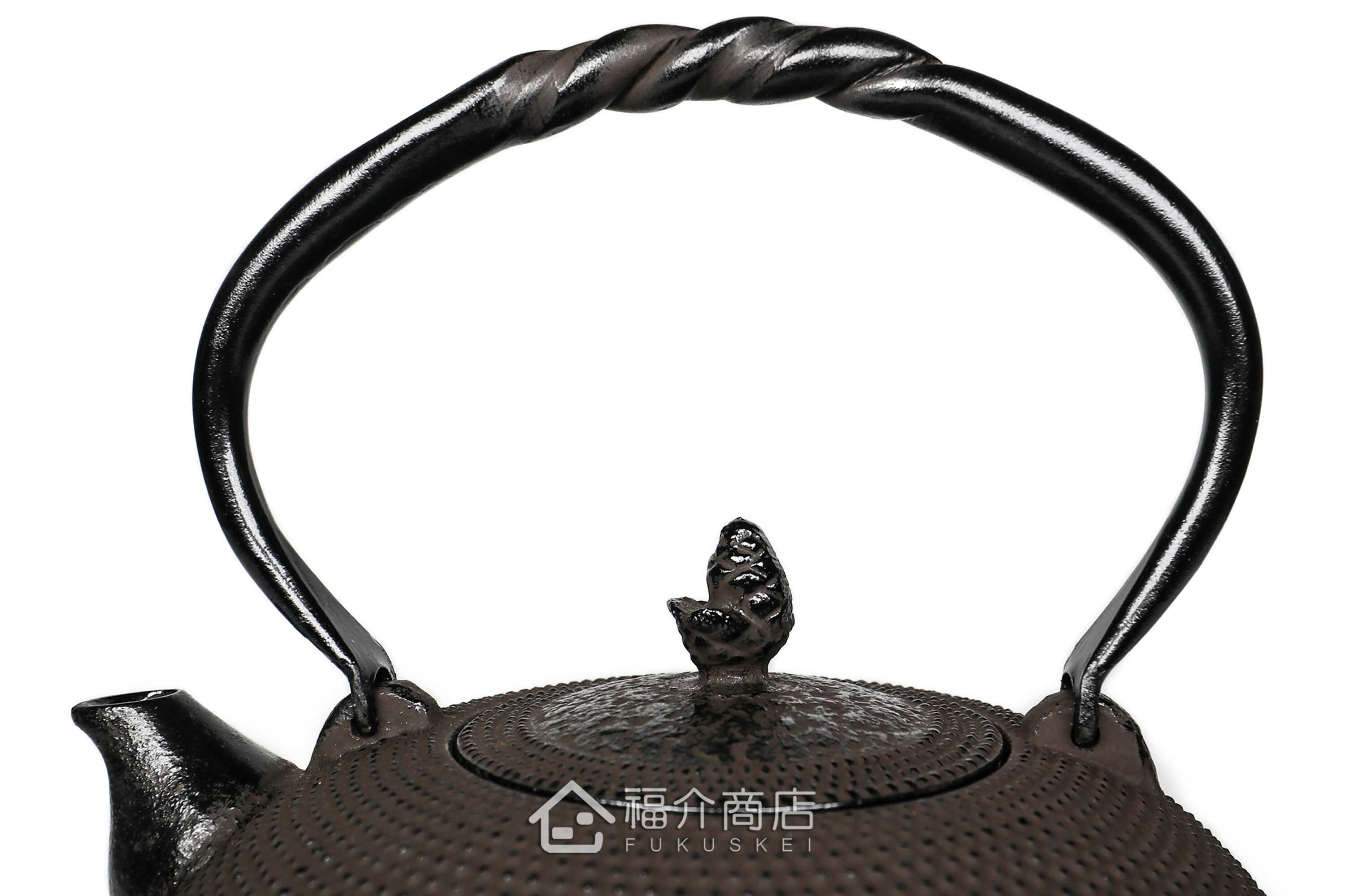 金秀堂所製作的日本鐵壺,壺身設計霰紋