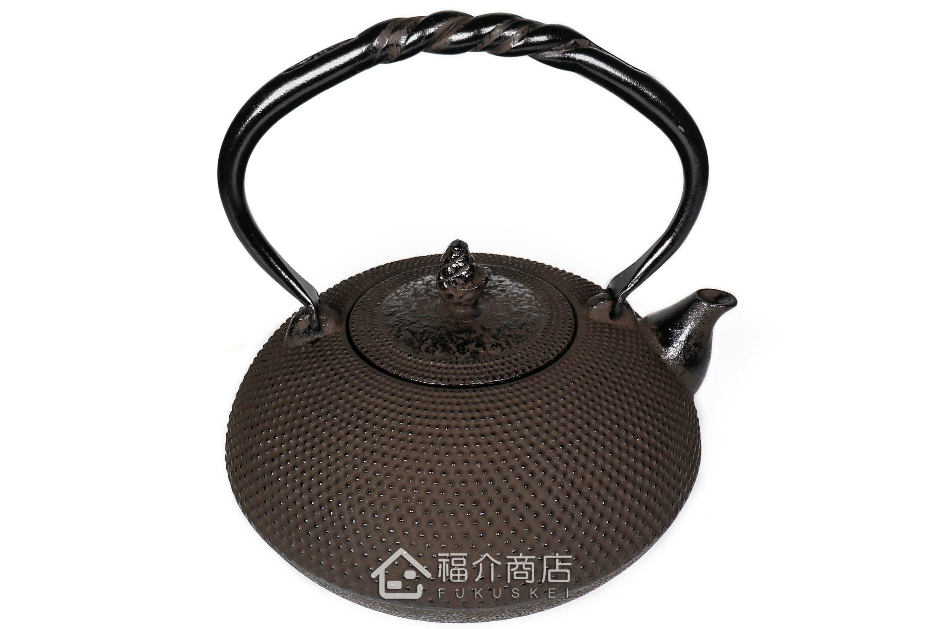 金秀堂所製作的日本鐵壺,壺身設計霰紋