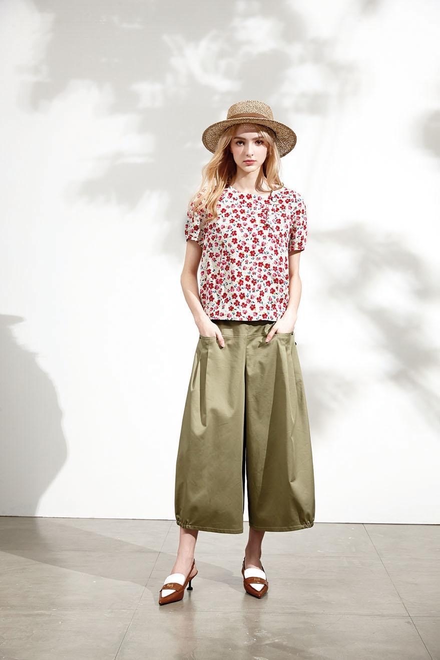 時尚口袋打摺釦子造型燈籠褲口設計休閒褲裙U6131