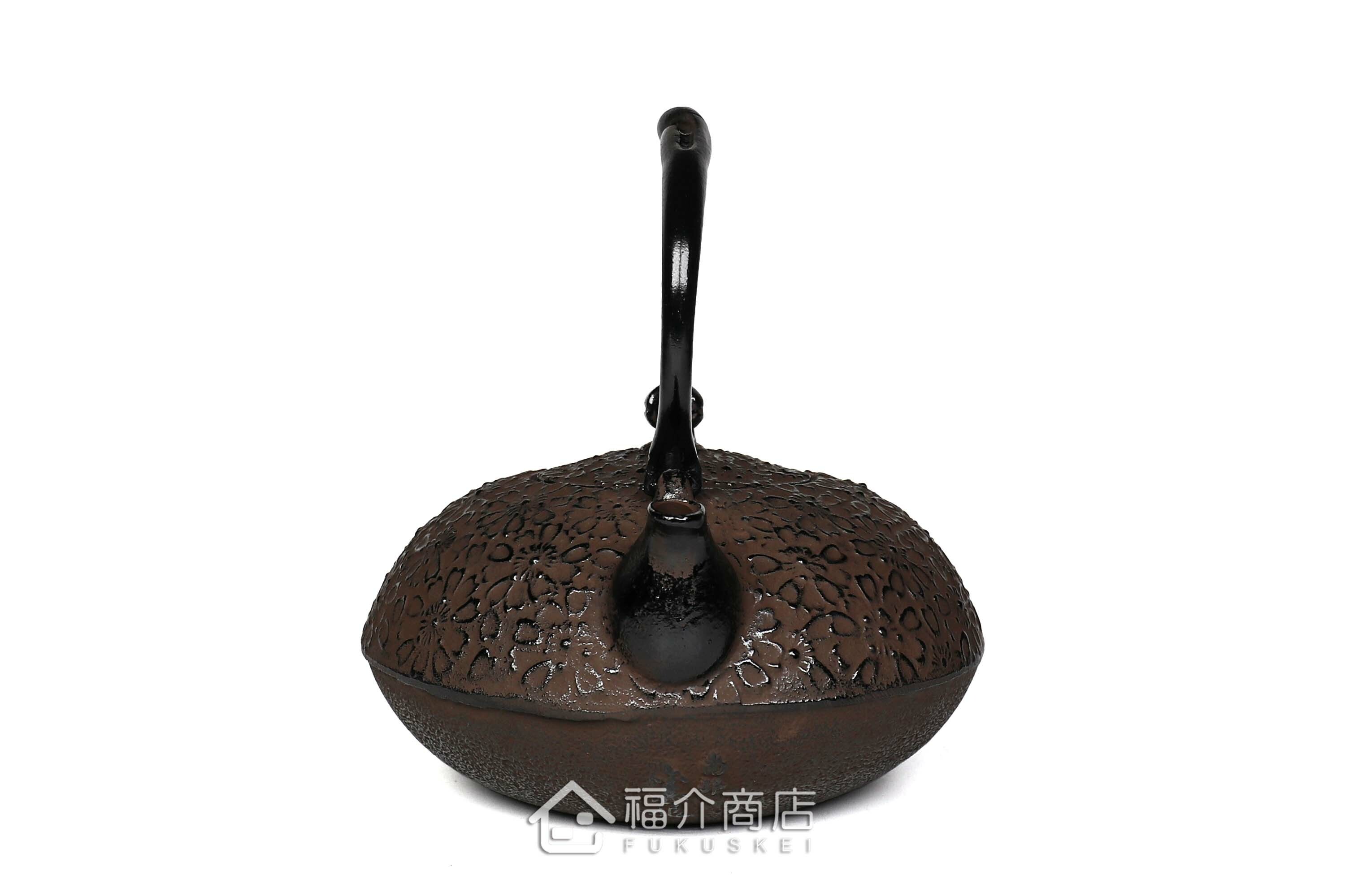 金秀堂所製作煮水泡茶用的日本鐵壺,壺身設計櫻花紋