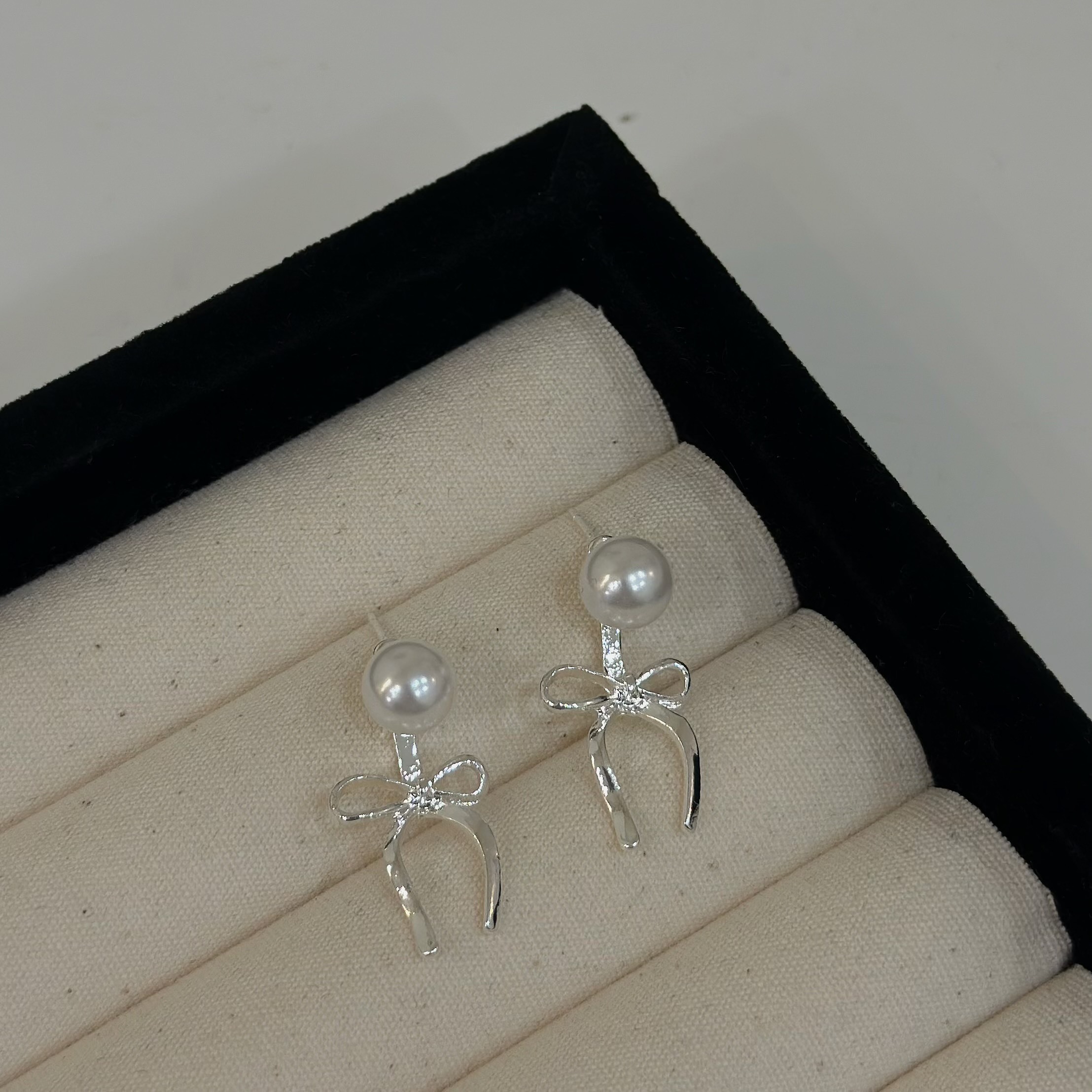 T19珍珠蝴蝶結前後扣垂吊