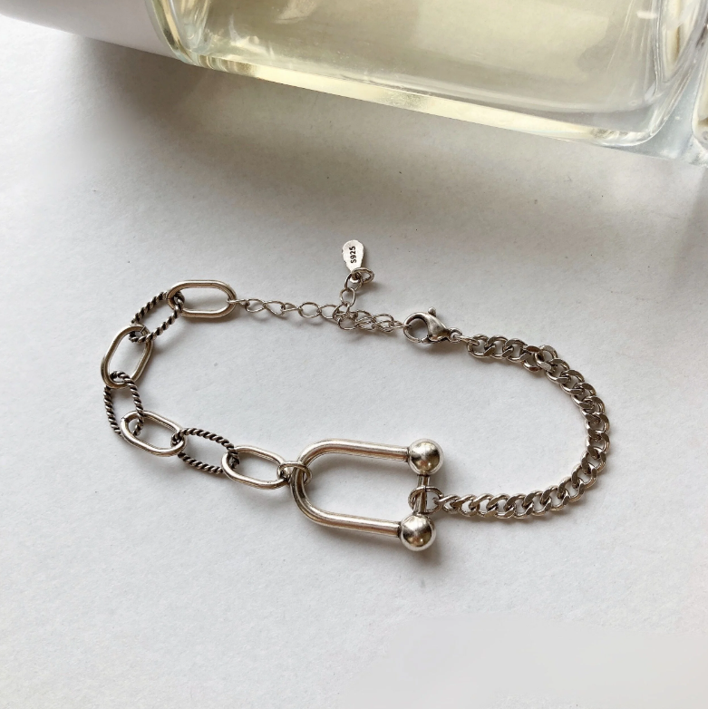 [LAUGHTER] Karabiner chain bracelet