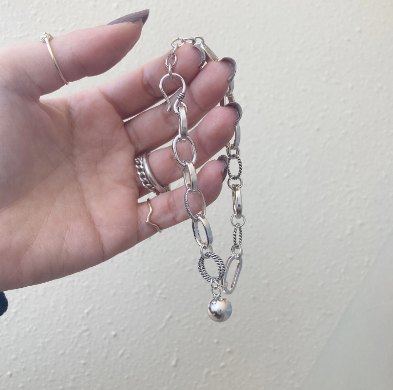 [LAUGHTER] metal bracelet