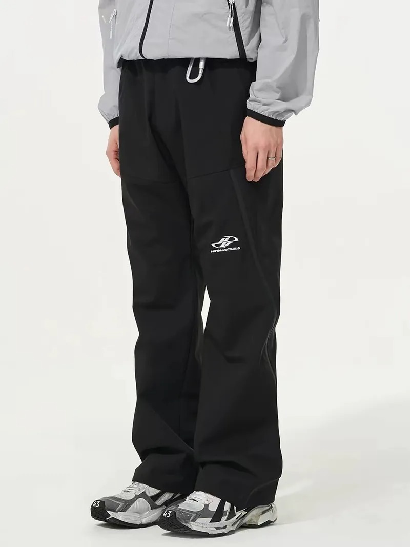 Harsh and Cruel 24SS 壓膠拉鍊結構微喇尼龍褲 HJ241150060