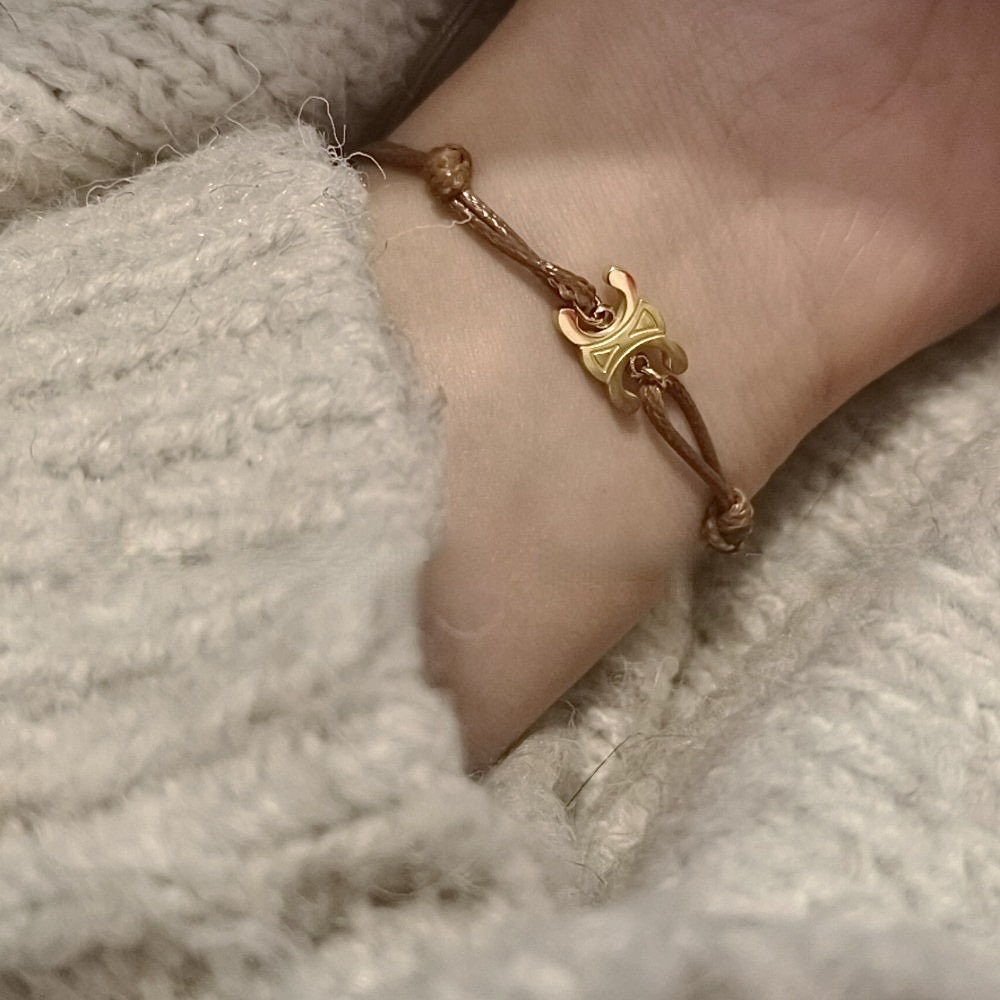 金凱旋門 咖皮革抽繩可調式手鍊/現貨1