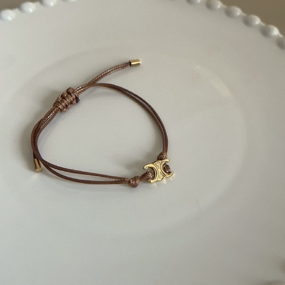 金凱旋門 咖皮革抽繩可調式手鍊/現貨1