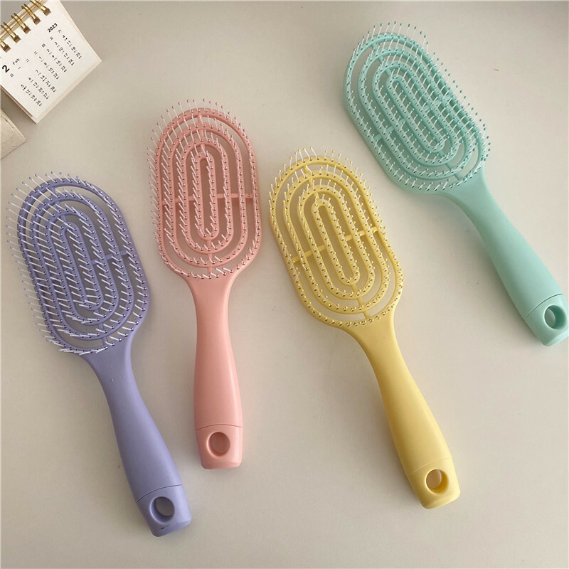 《4239》繽紛馬卡龍縷空氣墊梳子