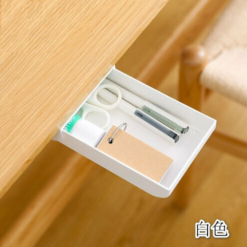 (White) small drawer with adhesive tape under the table