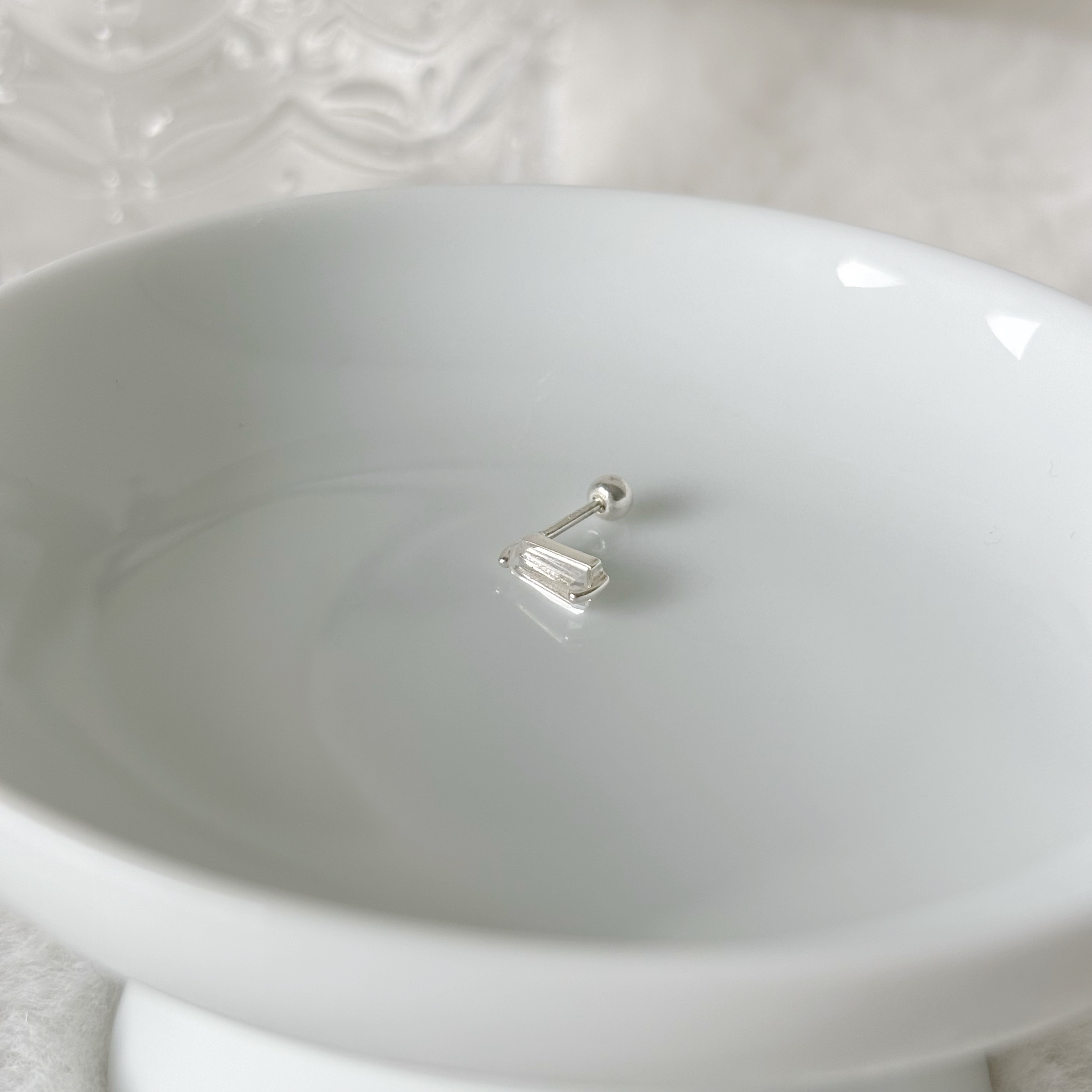 雙爪梯形白水晶轉珠耳環