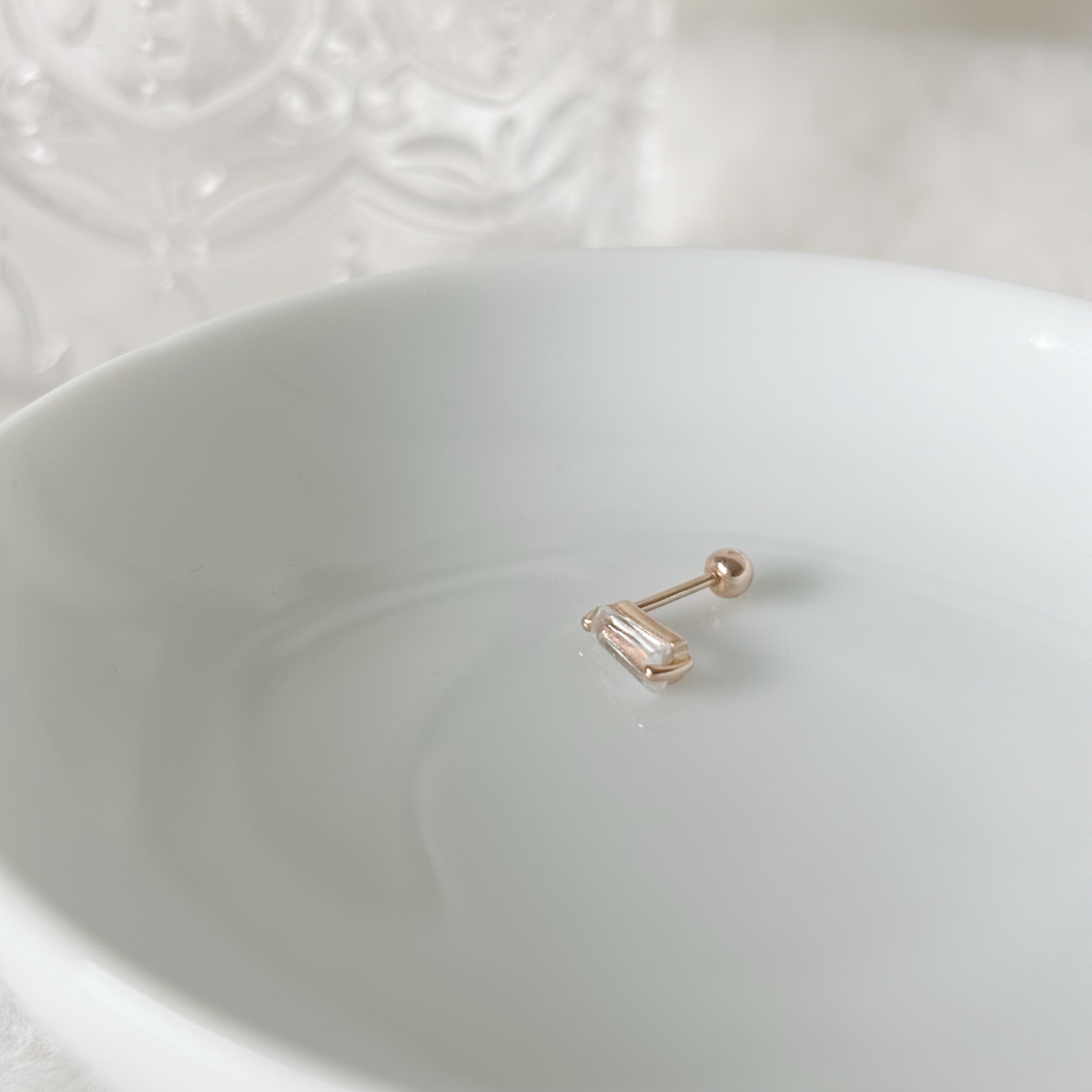 雙爪梯形白水晶轉珠耳環