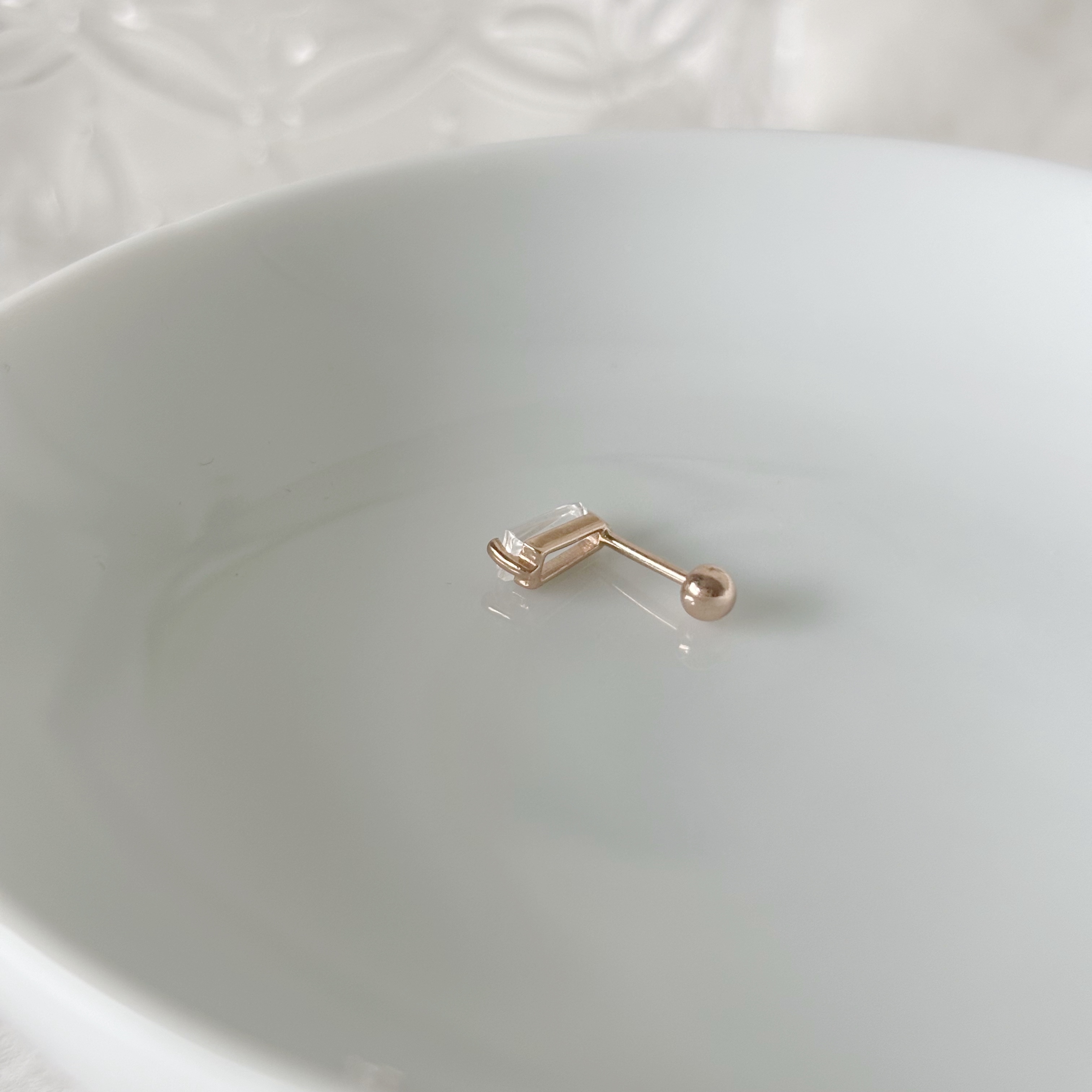 雙爪梯形白水晶轉珠耳環