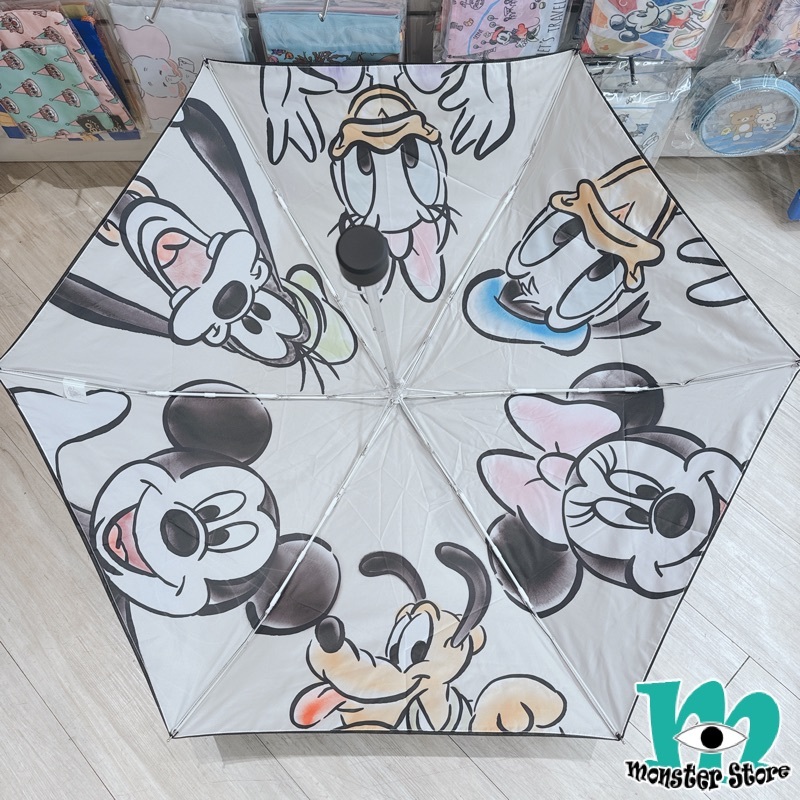 米奇與朋友摺傘