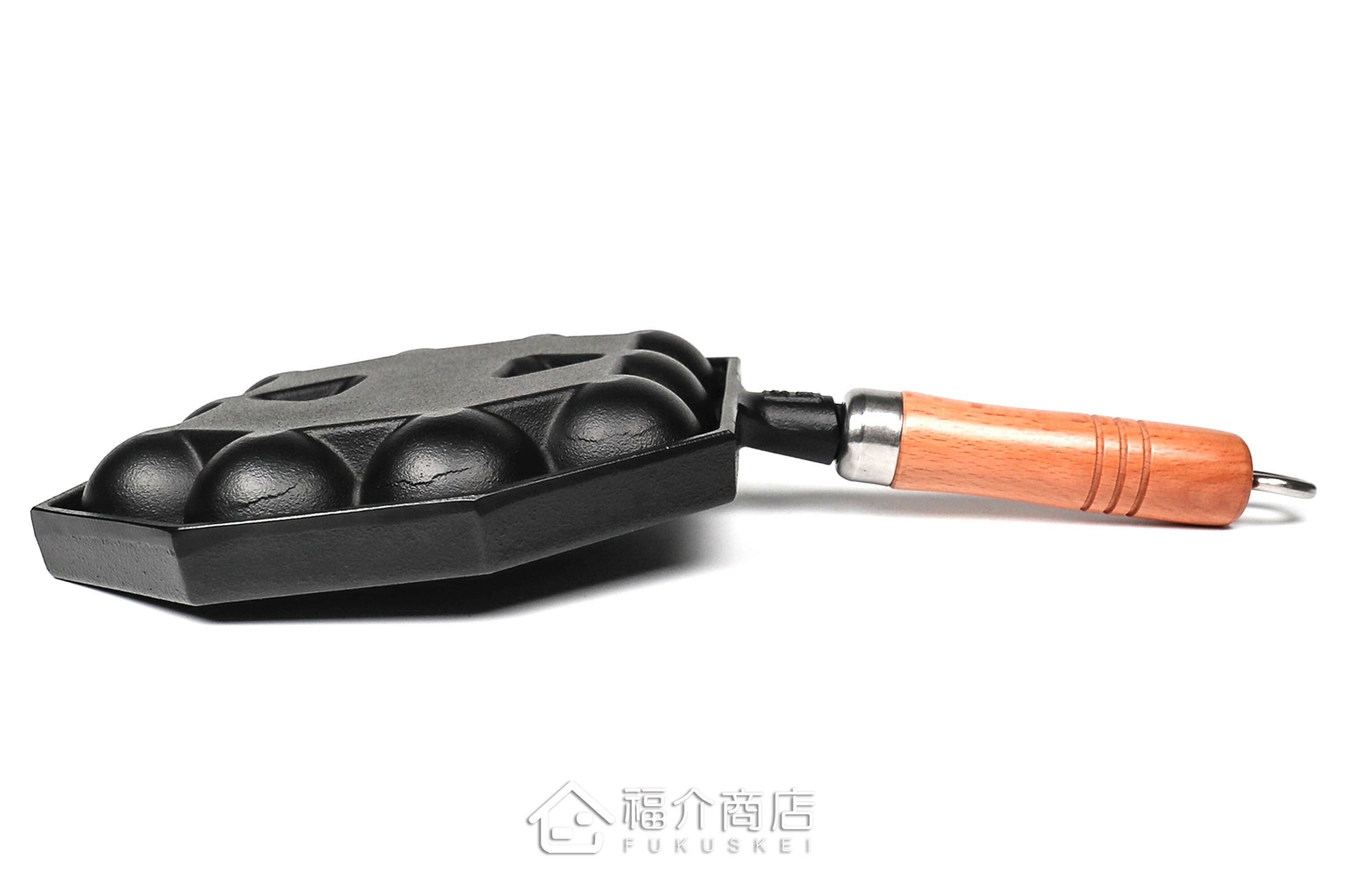 可以做14個章魚燒的黑色鑄鐵鍋有木柄把手