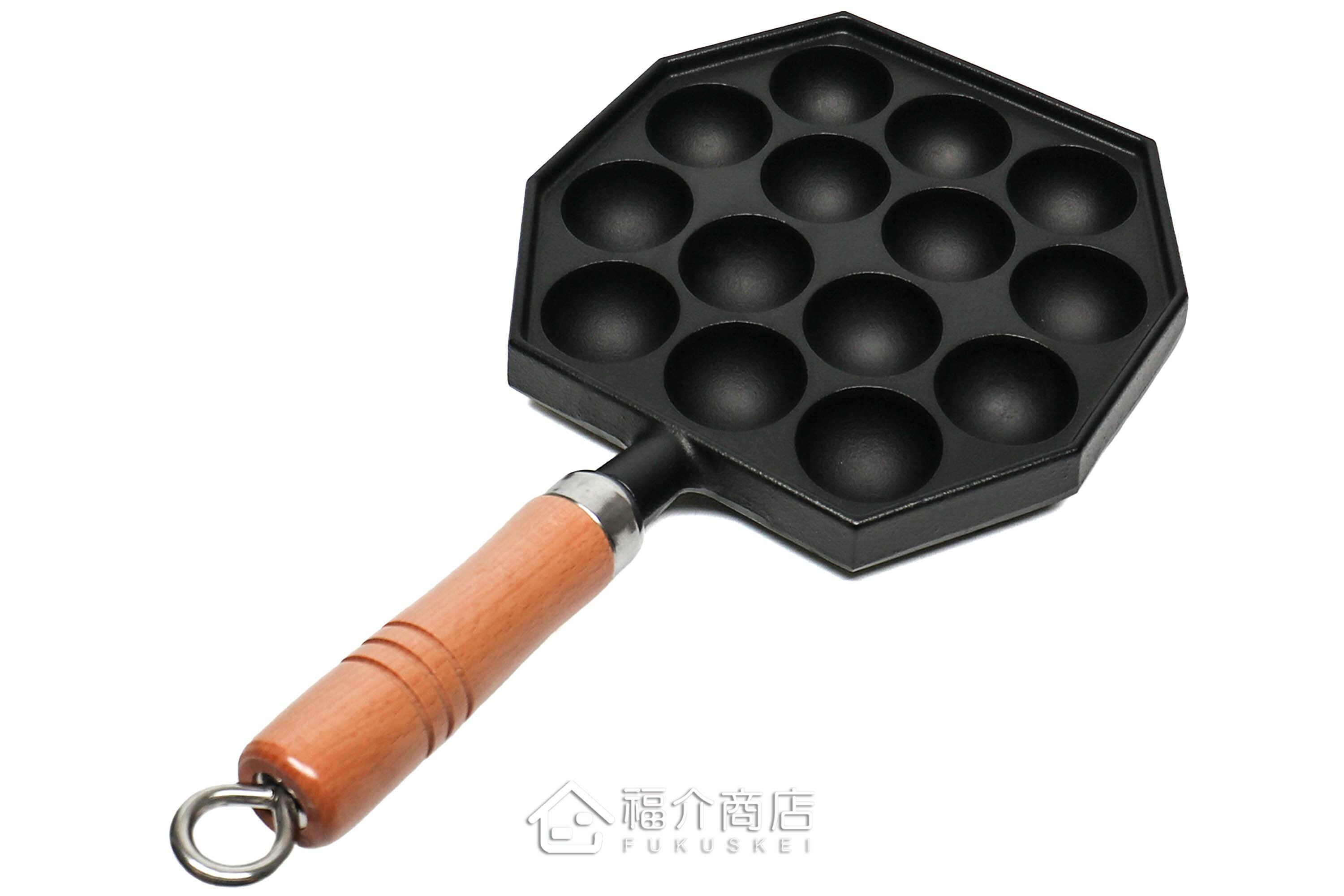 可以做14個章魚燒的黑色鑄鐵鍋有木柄把手