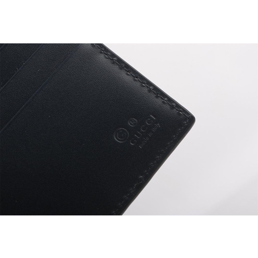 【GUCCI】GG Logo 大標誌壓印牛皮對開8卡短夾(深藍色) 779836 CWC1N 4009