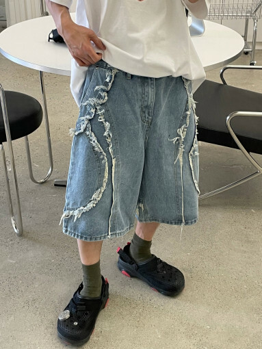 剪邊流蘇波浪剪裁水洗牛仔短褲