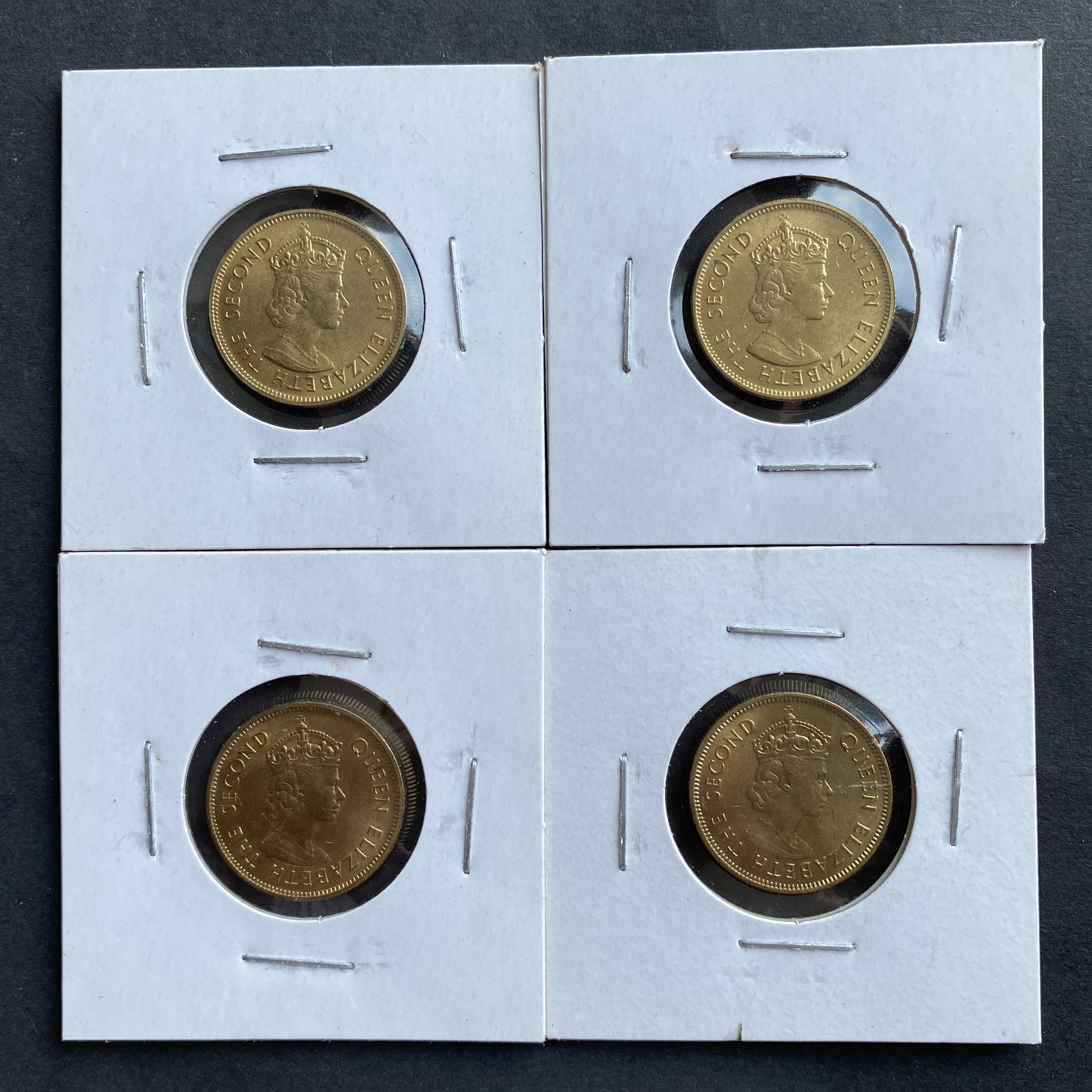 A set of four 1975 Queen Elizabeth II - ten cents coins