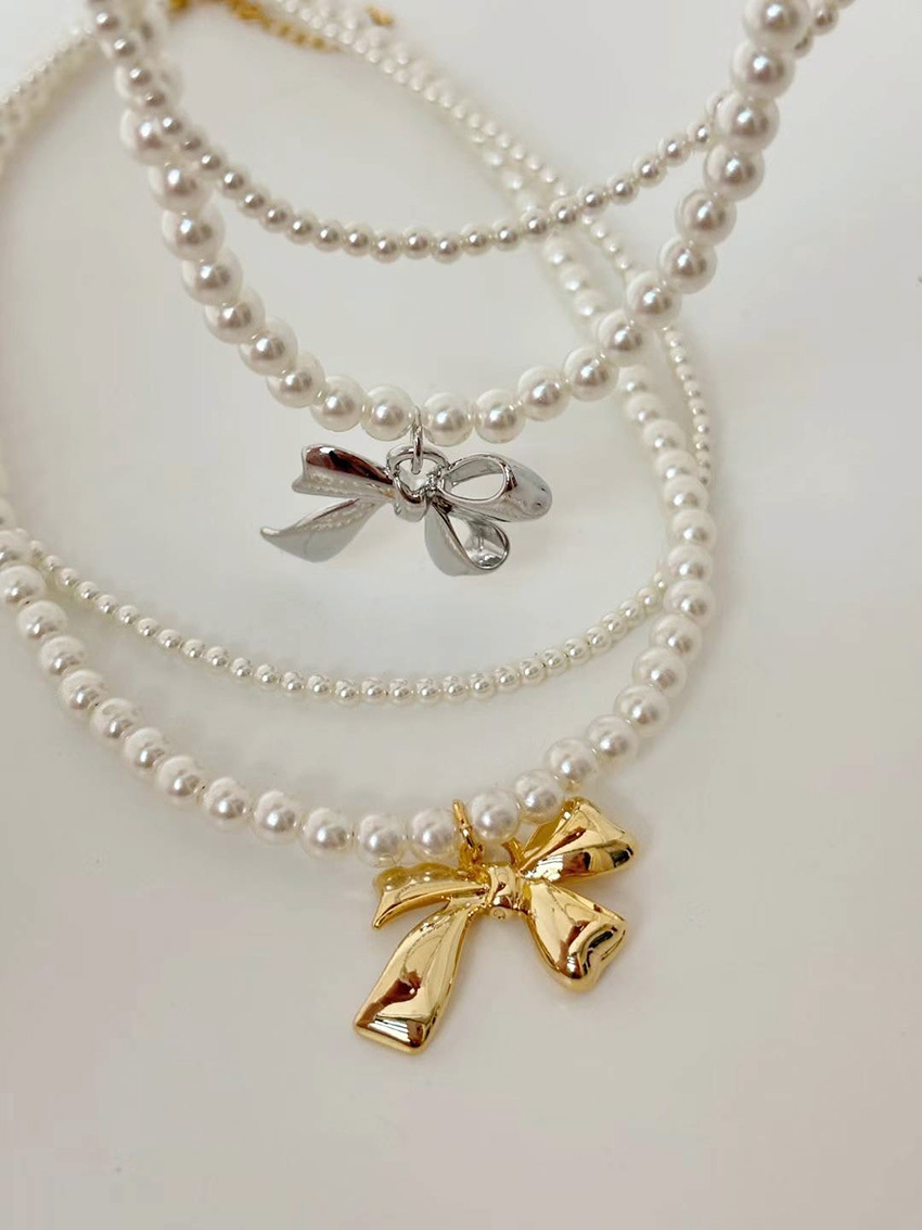 bow pendant pearl layered chain