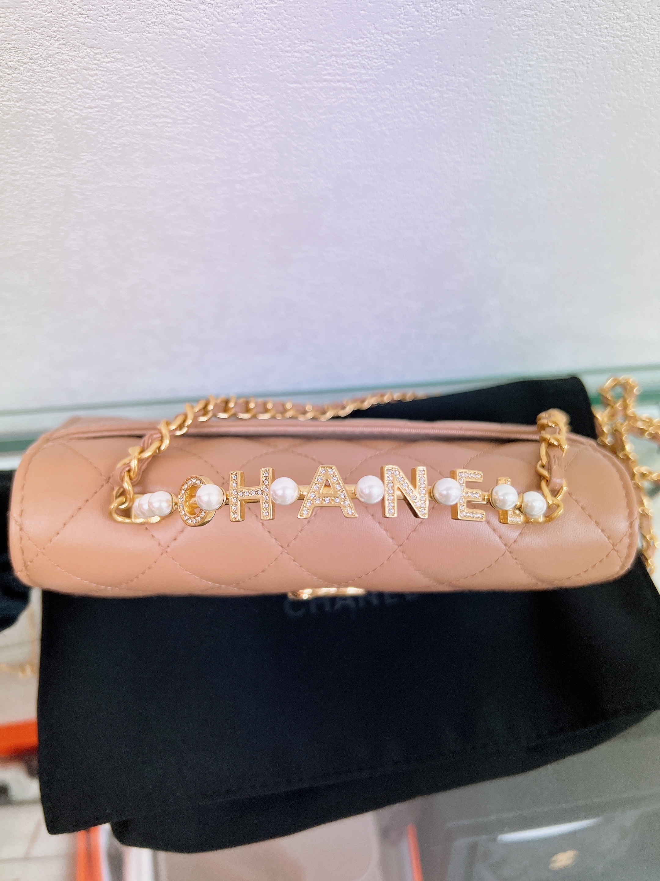 Chanel 23b kelly flap bag with pearl handle (beige lambskin)