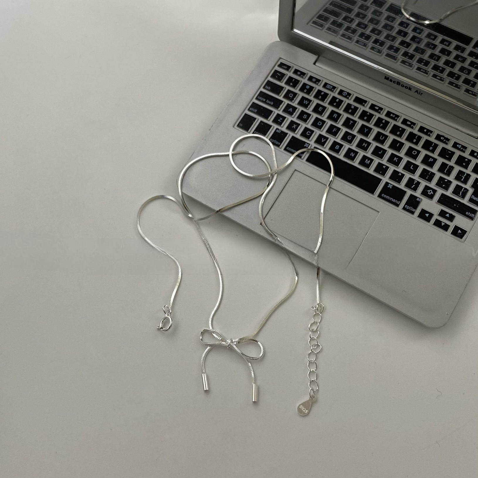 G55悸動．蝴蝶結純銀蛇骨鍊