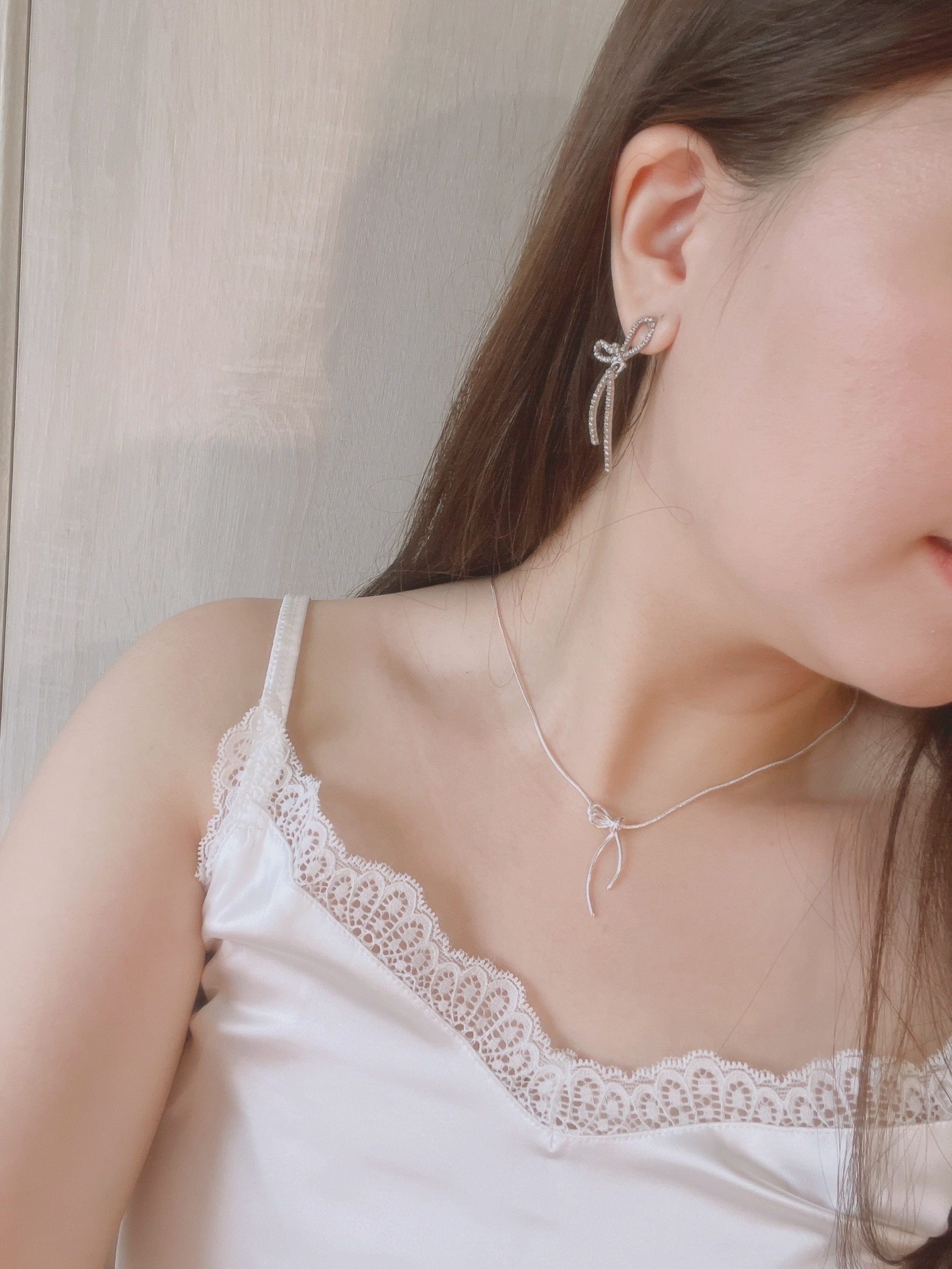 925純銀 - 韓風氣質鑽面蝴蝶結耳環