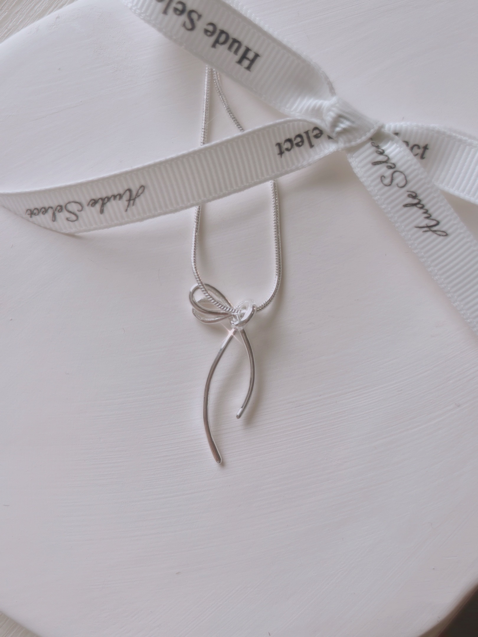 [韓國人氣項鍊!🎀] N12 Polished bowknot necklace - silver925