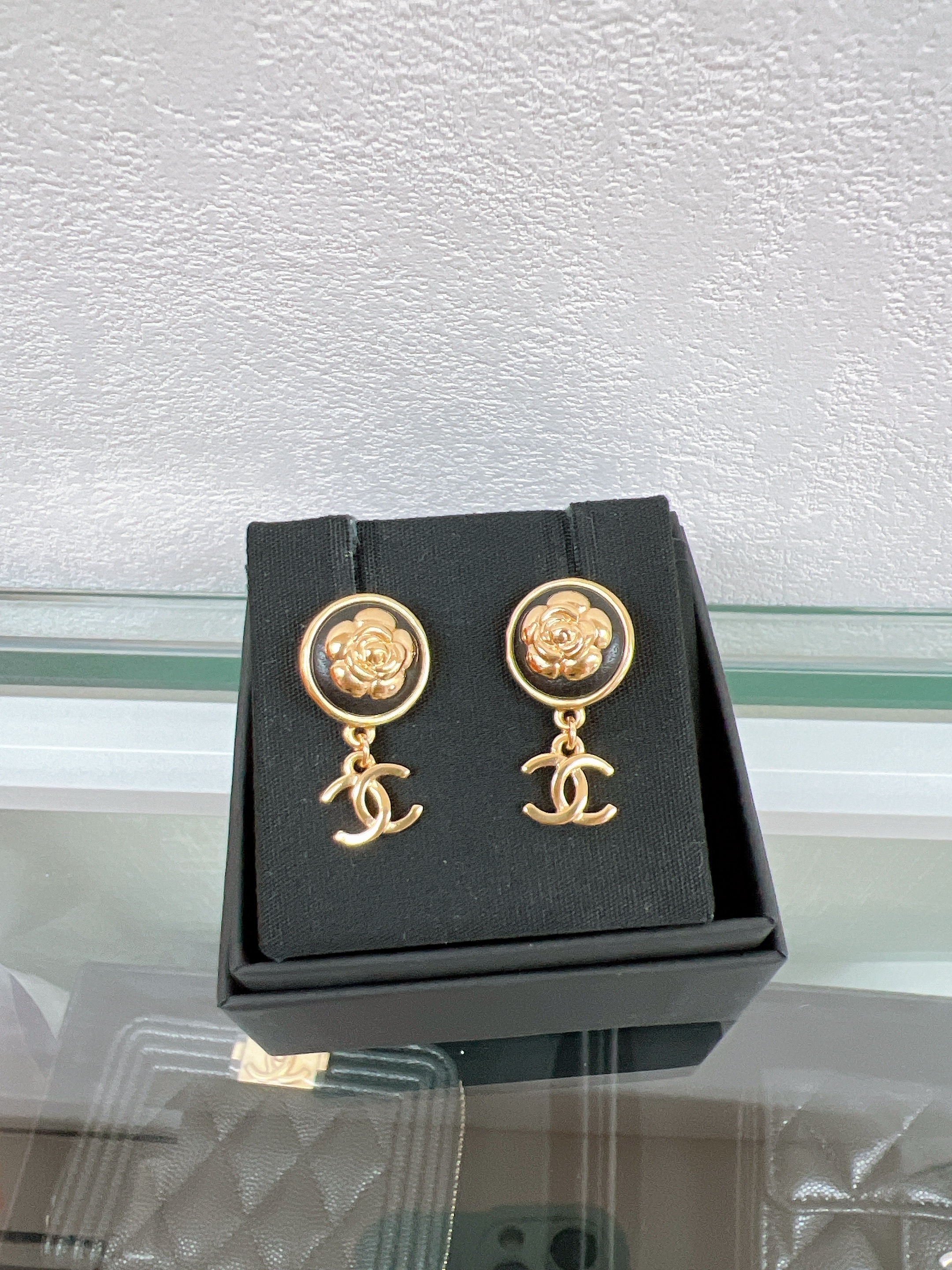 Chanel earrings (black floral logo)