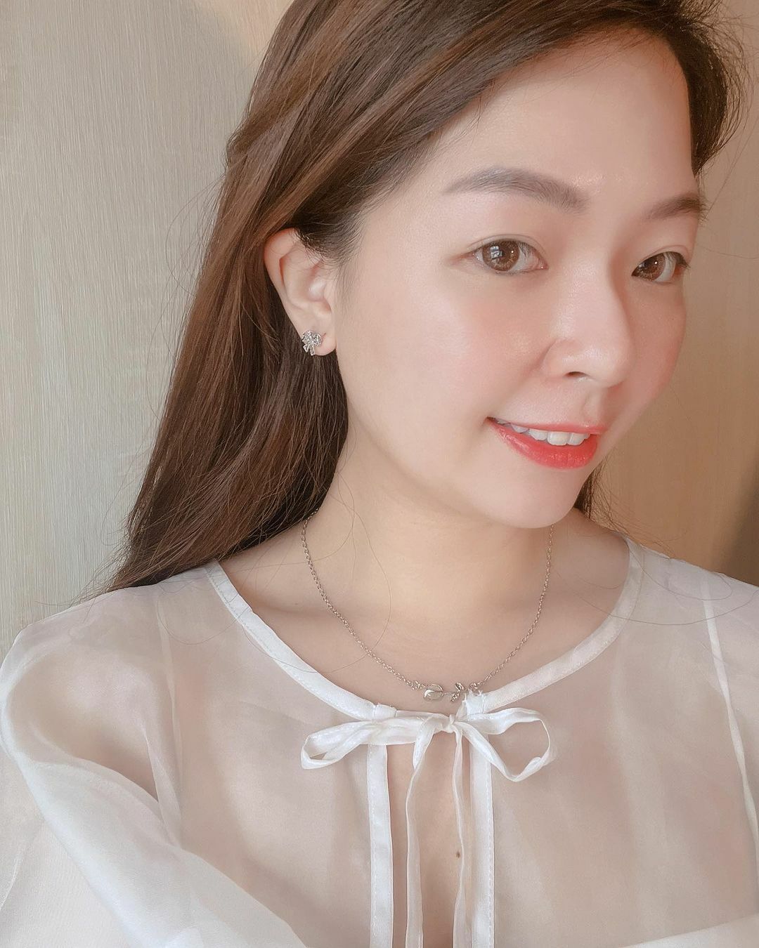 浪漫愛心簍空蝴蝶結純銀耳環