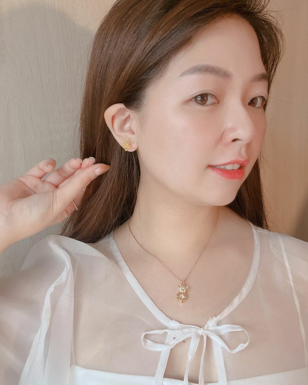 浪漫愛心簍空蝴蝶結純銀耳環