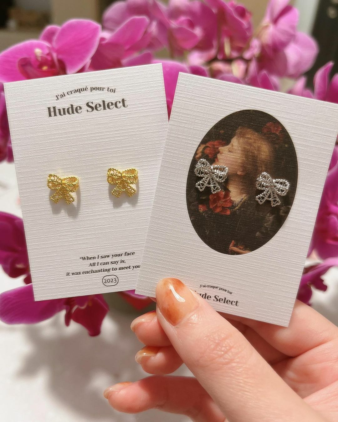 浪漫愛心簍空蝴蝶結純銀耳環