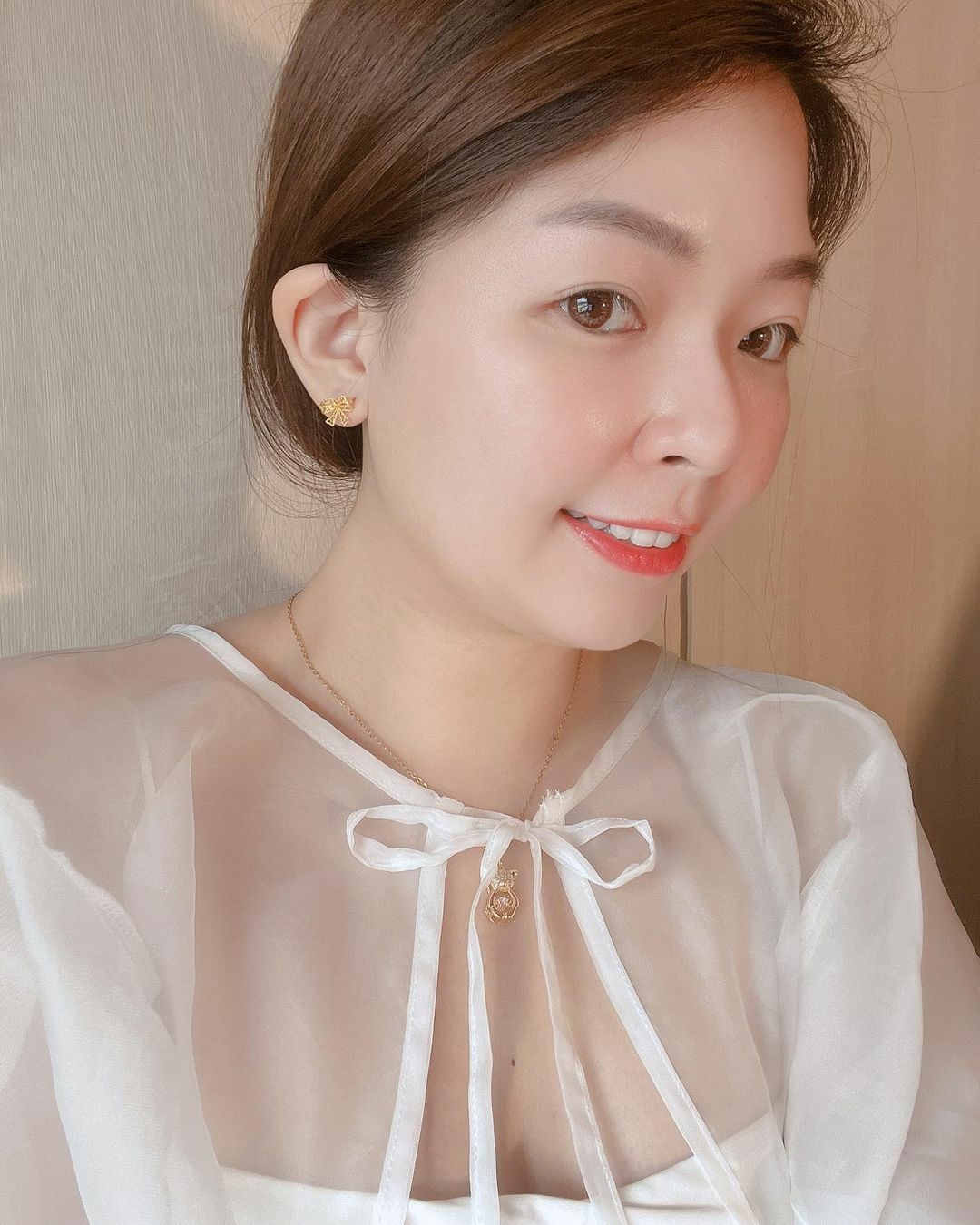 浪漫愛心簍空蝴蝶結純銀耳環