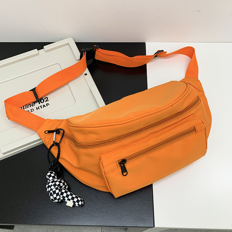 Popular casual crossbody bag, sports backpack, outdoor shoulder bag (orange [with black and white checkered keychain pendant])