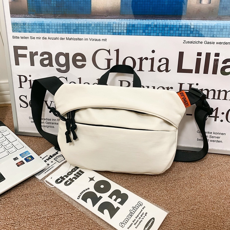 Popular casual crossbody bag, sports backpack, outdoor shoulder bag (white)