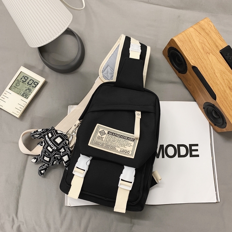 Popular casual crossbody bag, sports backpack, outdoor shoulder bag (black [with black plaid rabbit pendant])