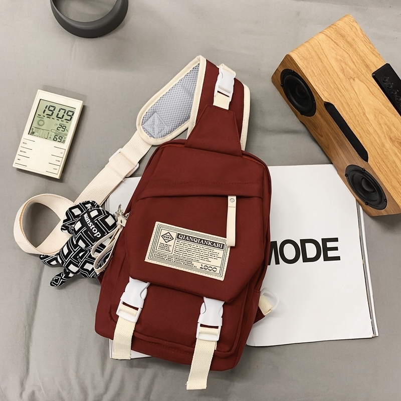 Popular casual crossbody bag, sports backpack, outdoor shoulder bag (red [with black plaid rabbit pendant])
