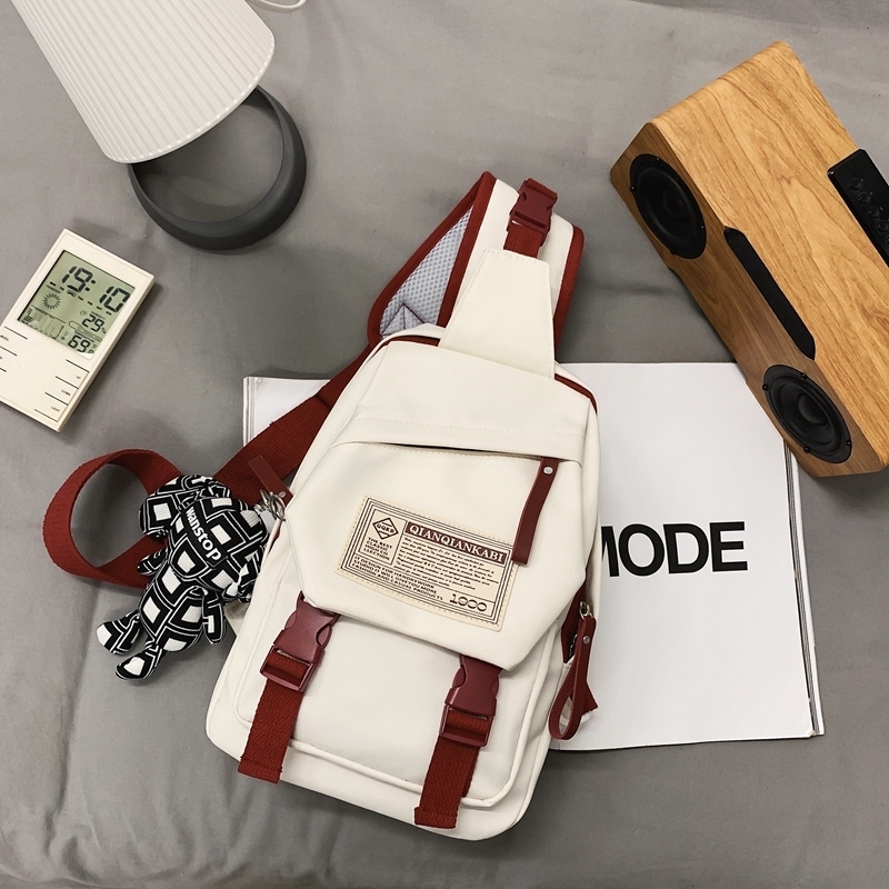 Popular casual crossbody bag, sports backpack, outdoor shoulder bag (white [with black plaid rabbit pendant])